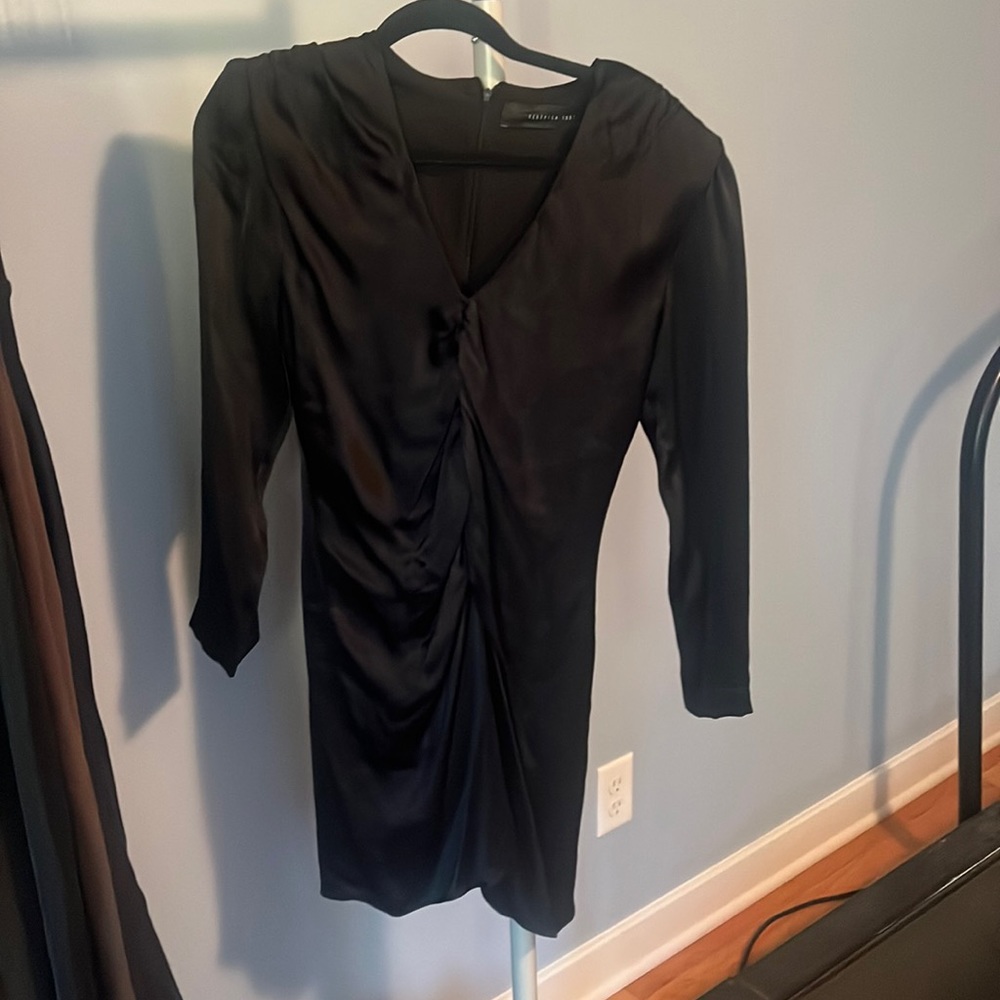 Black satin long sleeve cocktail dress with rouching down front